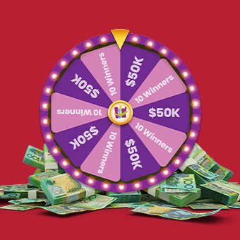 Purple spinning wheel with segments that read 10 Winners and $50K with pile od cash on red background
