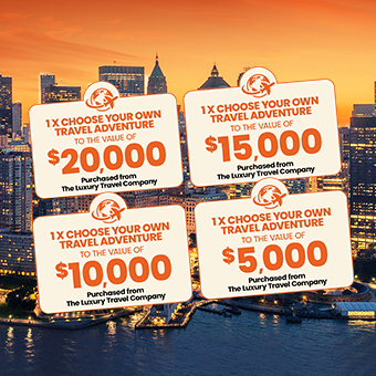 City skyline at sunset with four travel gift cards