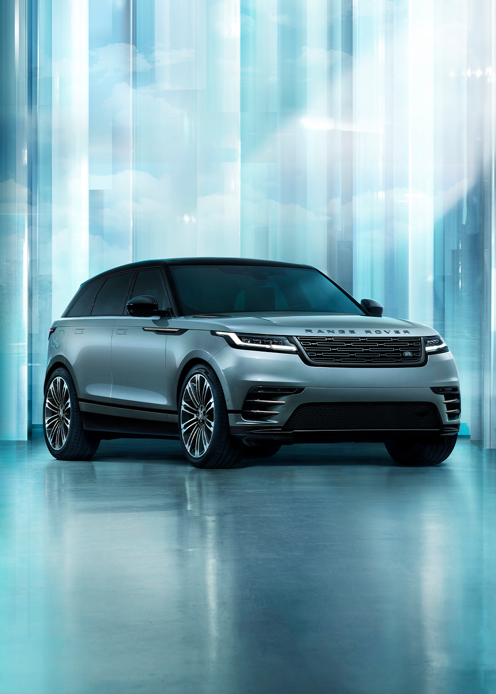 Range rover in blue in a matching blue space-age backdrop