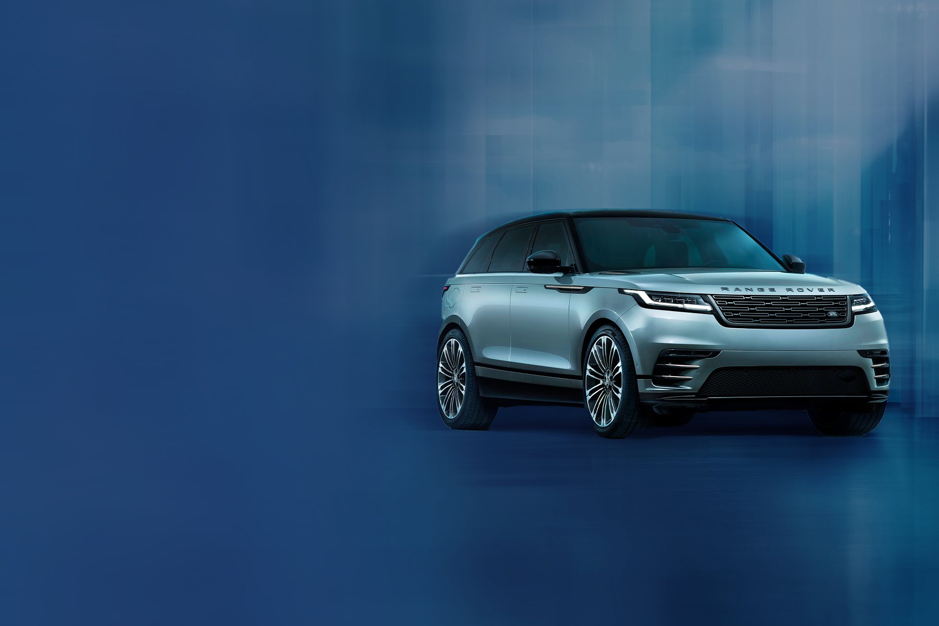 Range rover in blue in a matching blue space-age backdrop